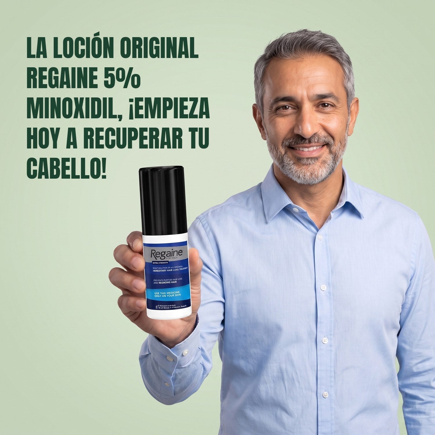 Man holding the Regaine for Men Minoxidil 5% lotion pack against a green background