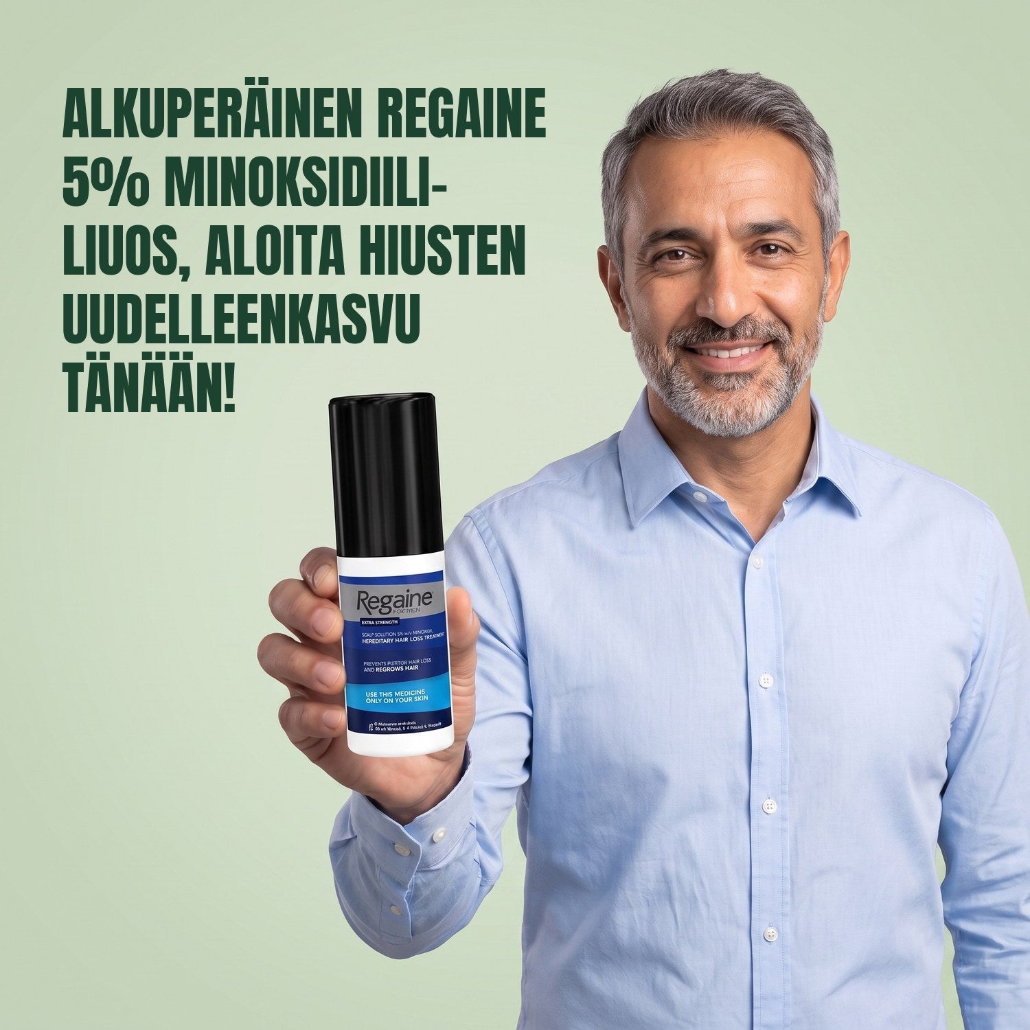 Man holding the Regaine for Men Minoxidil 5% lotion pack against a green background