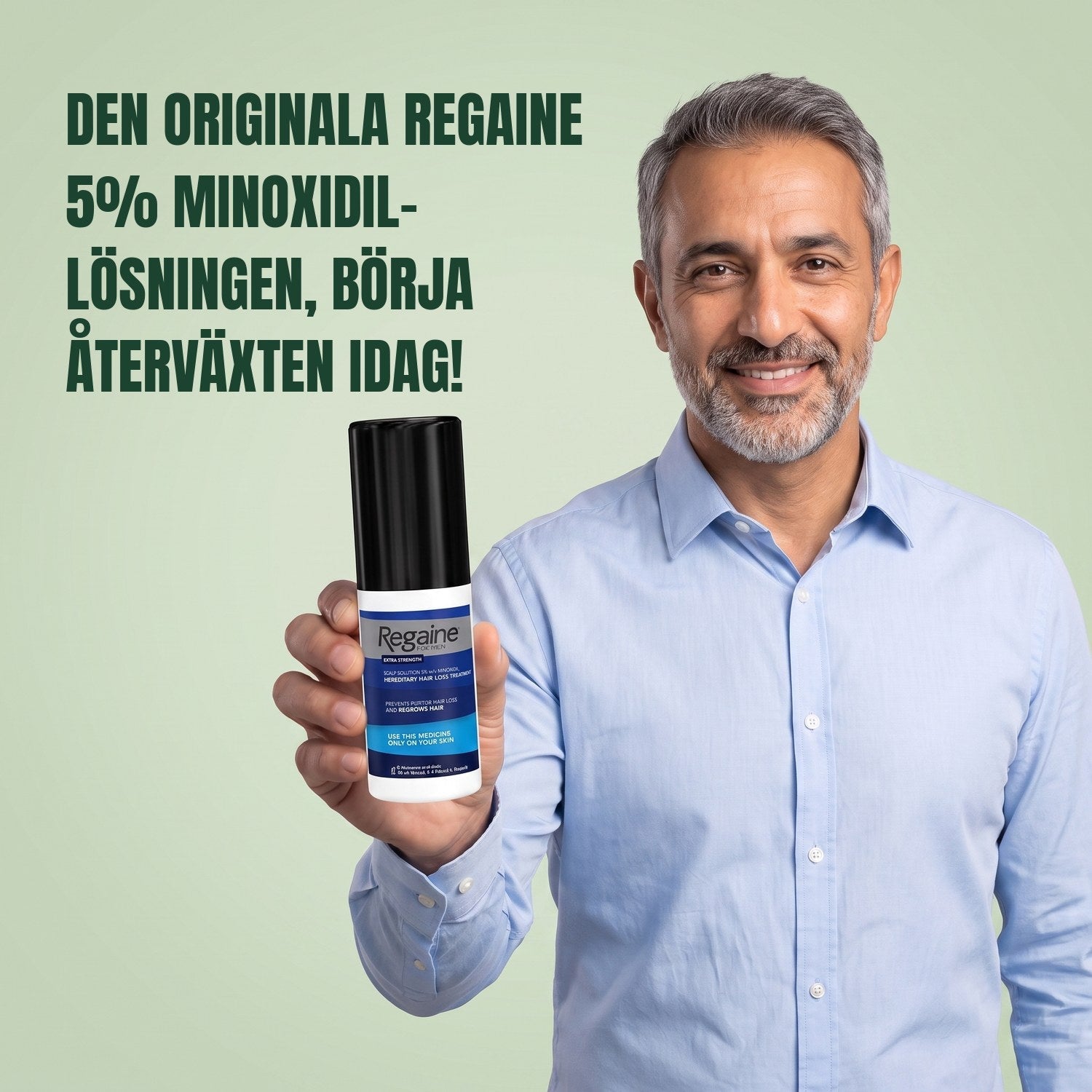 Man holding the Regaine for Men Minoxidil 5% lotion pack against a green background