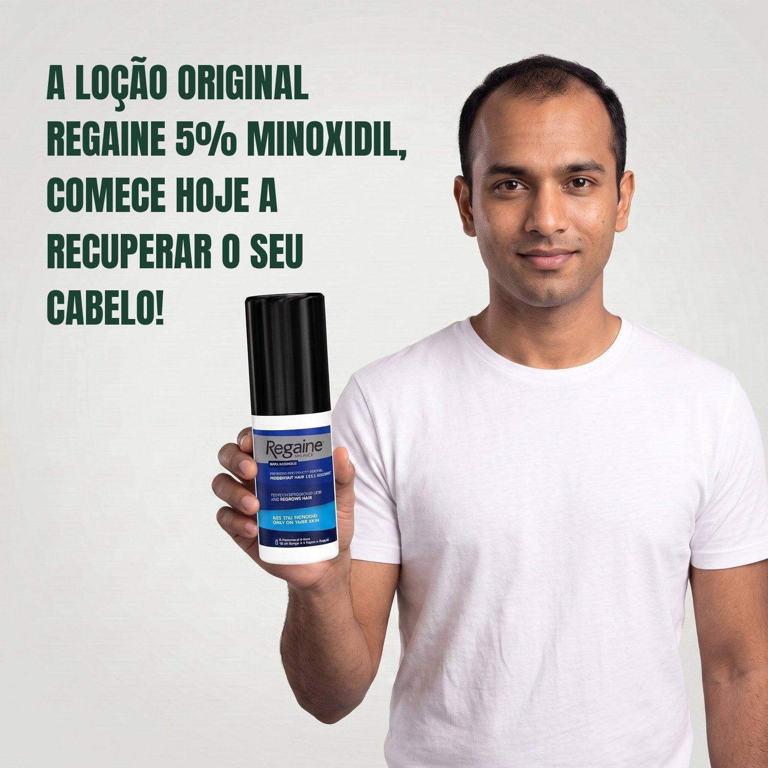 Man holding the Regaine for Men Minoxidil 5% lotion pack against a green background