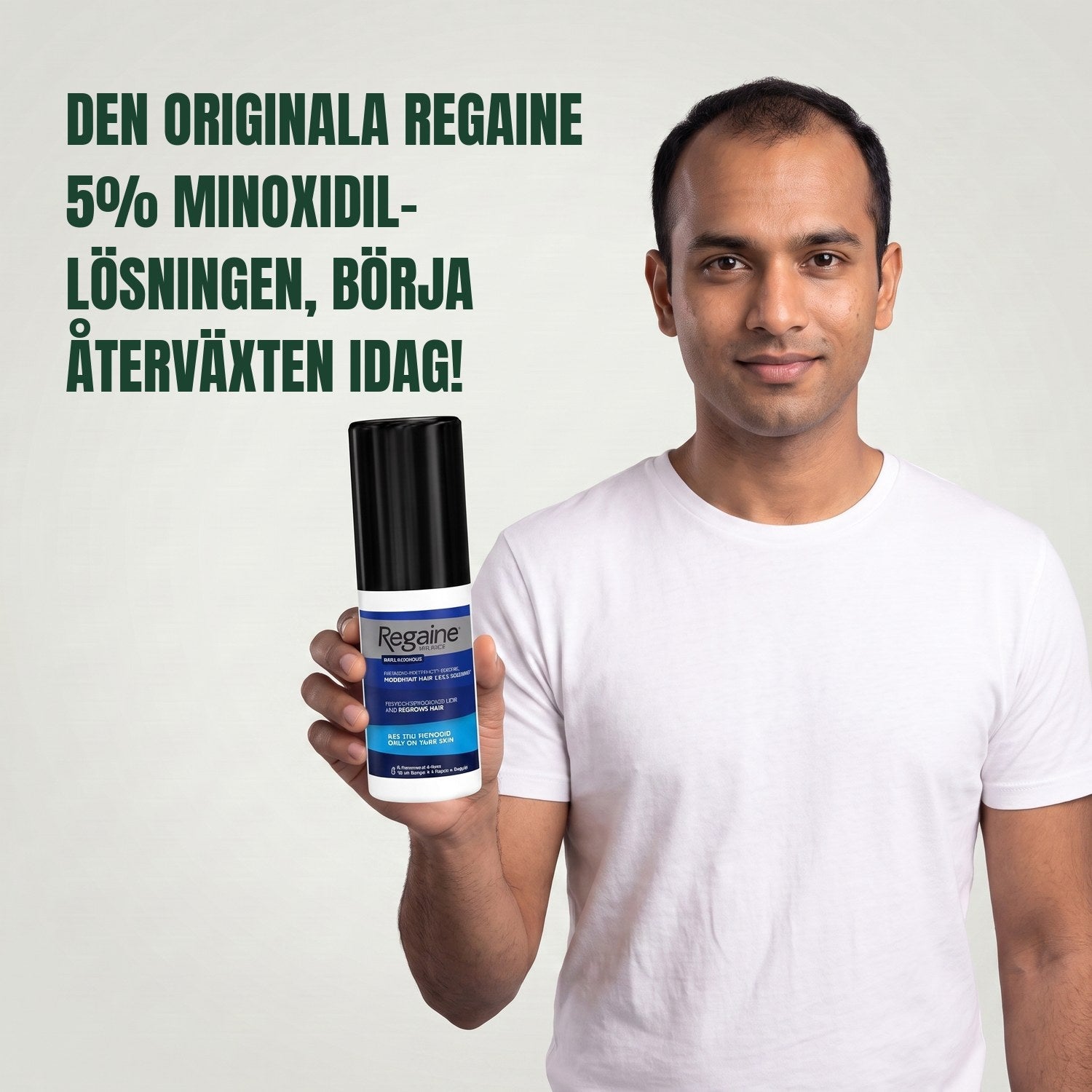 Man holding the Regaine for Men Minoxidil 5% lotion pack against a green background