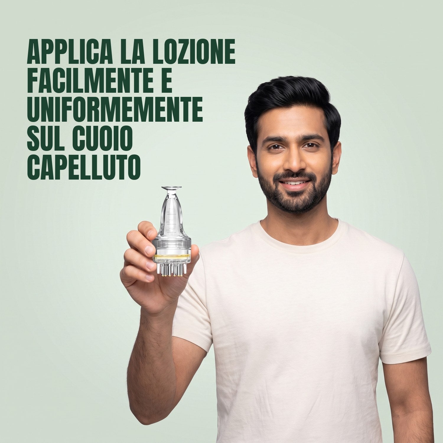 Man holding a basic minoxidil lotion applicator against a green background