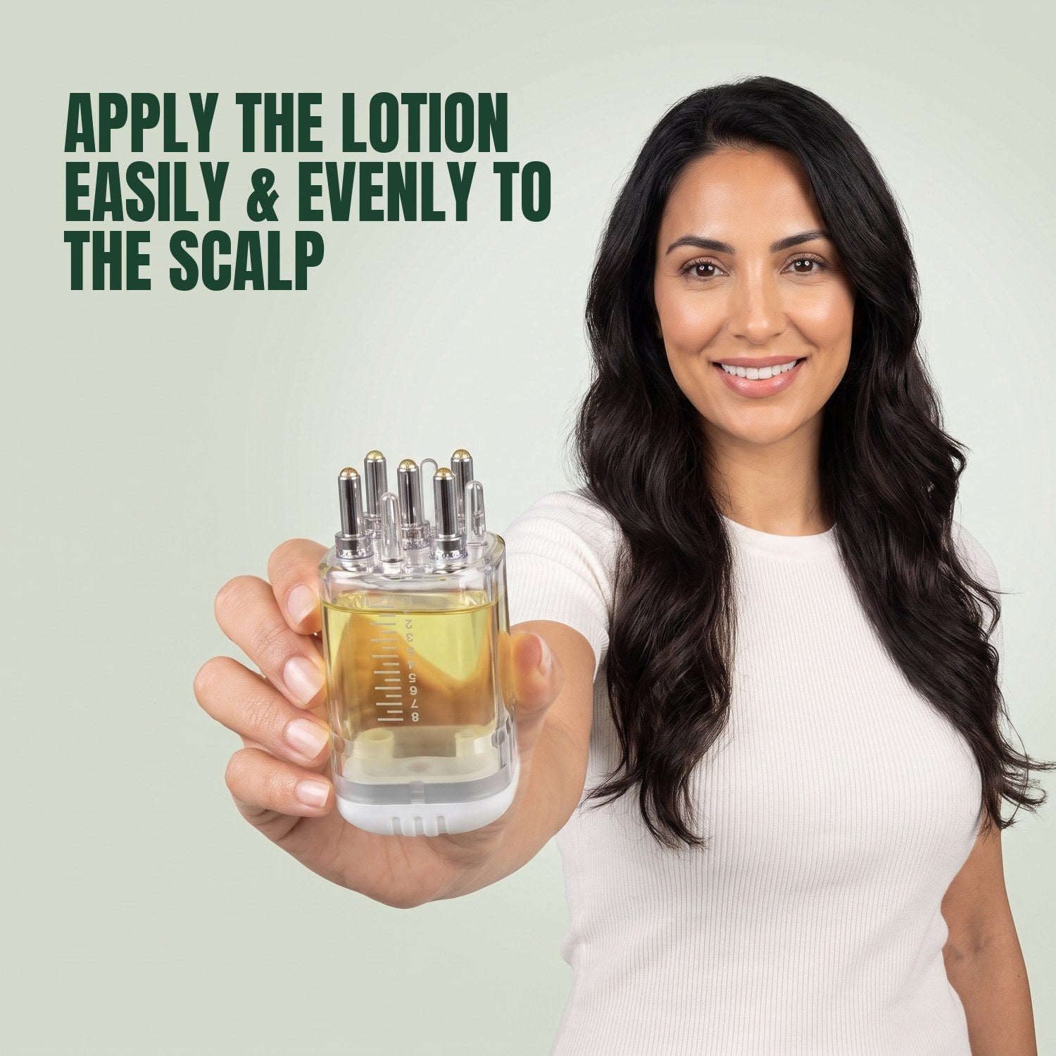 Woman holding a premium minoxidil lotion applicator against a green background