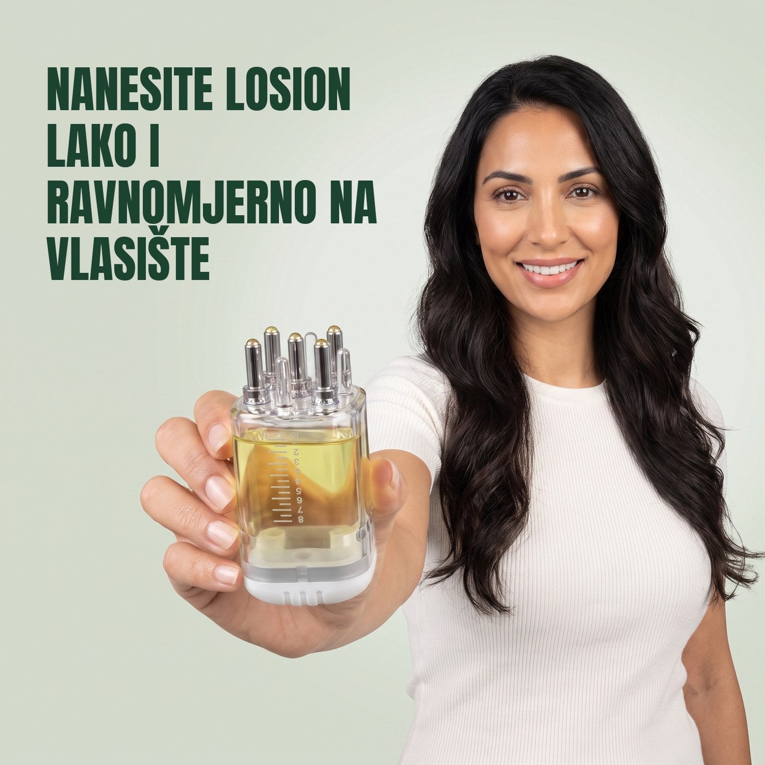 Woman holding a premium minoxidil lotion applicator against a green background