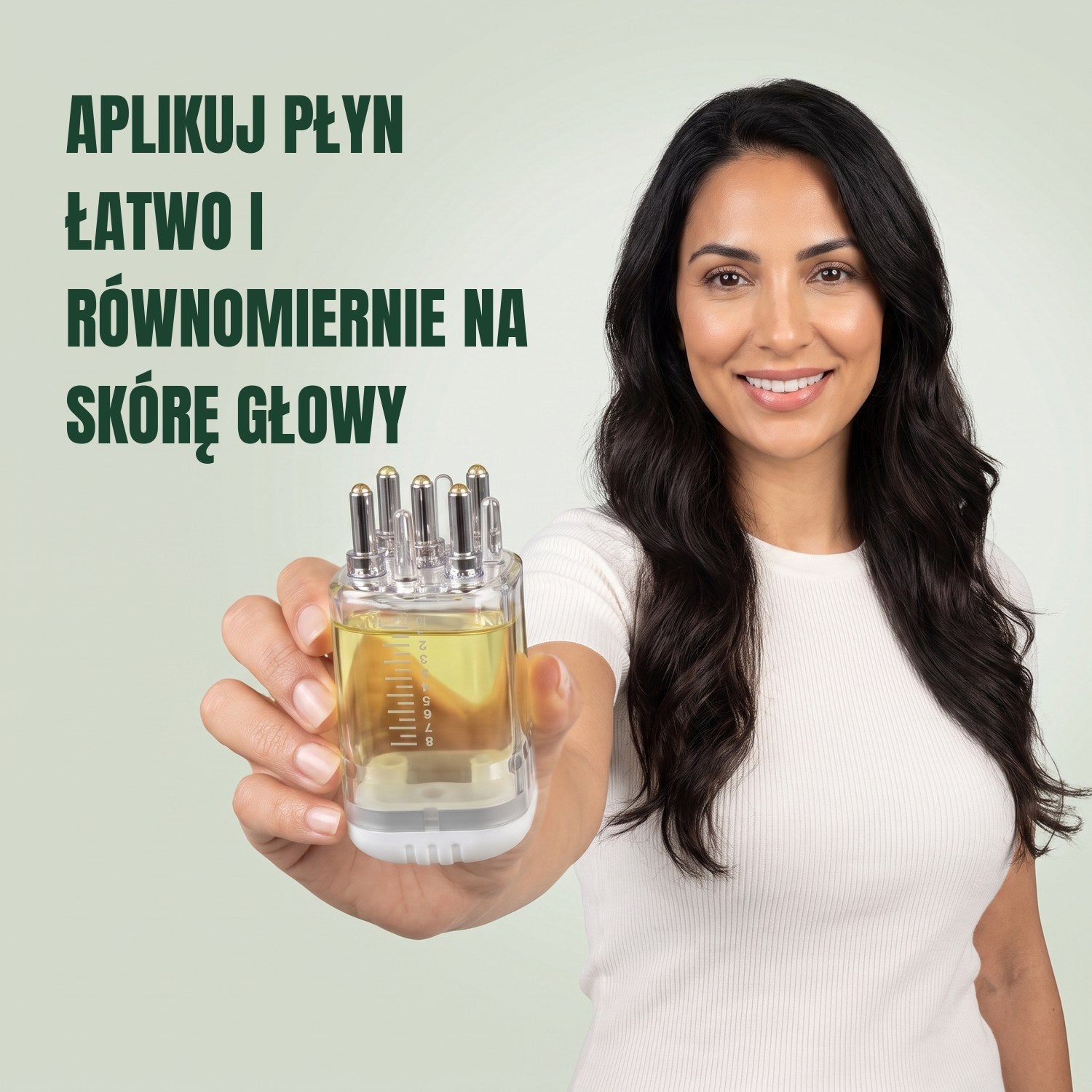 Woman holding a premium minoxidil lotion applicator against a green background